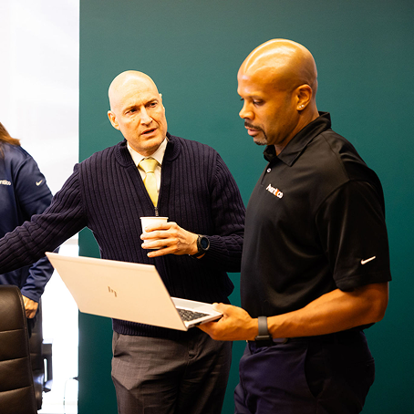 A finance team reviewing figures together