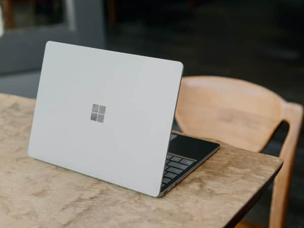 Windows Surface laptop on a wooden desk